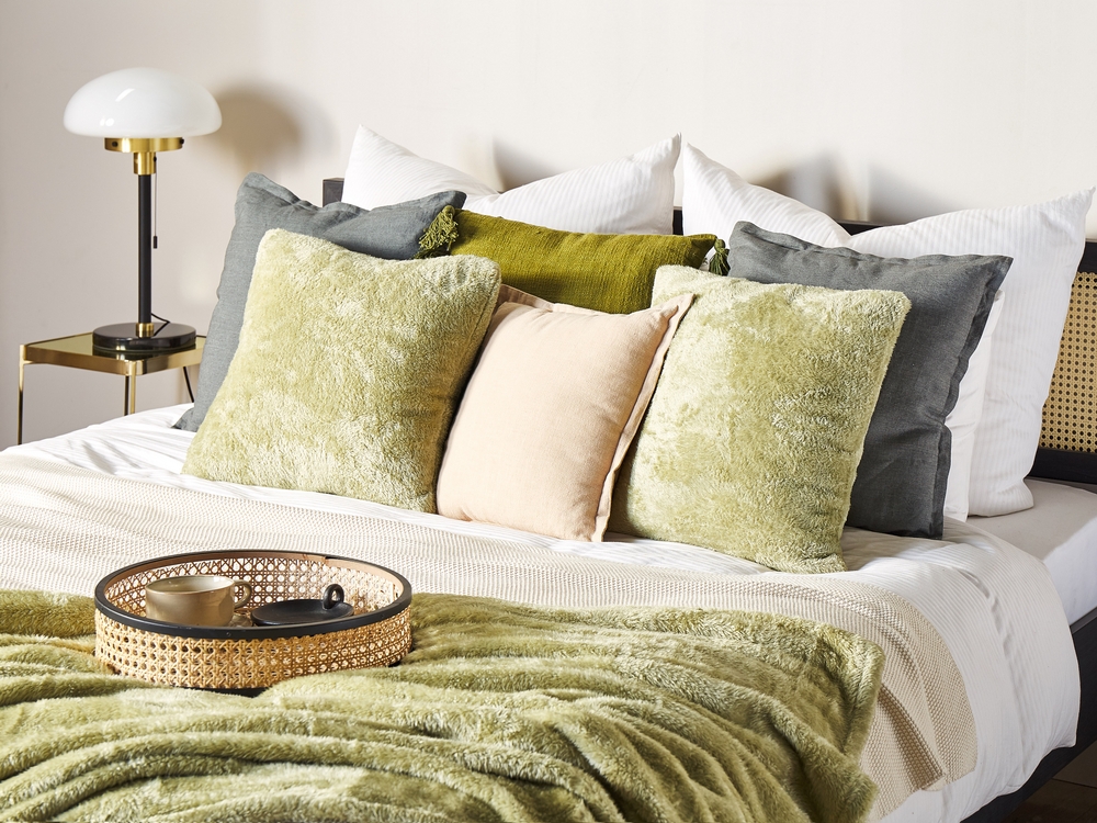 Green faux outlet fur cushion